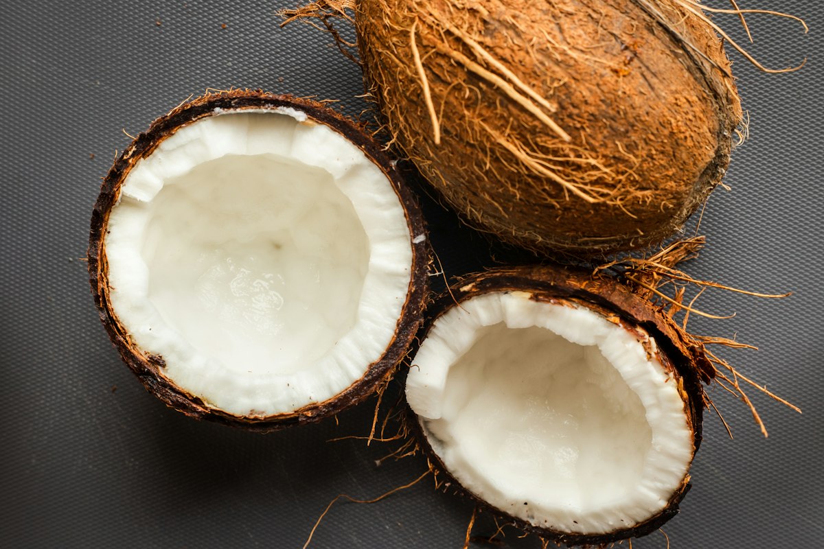 Halved mature coconuts