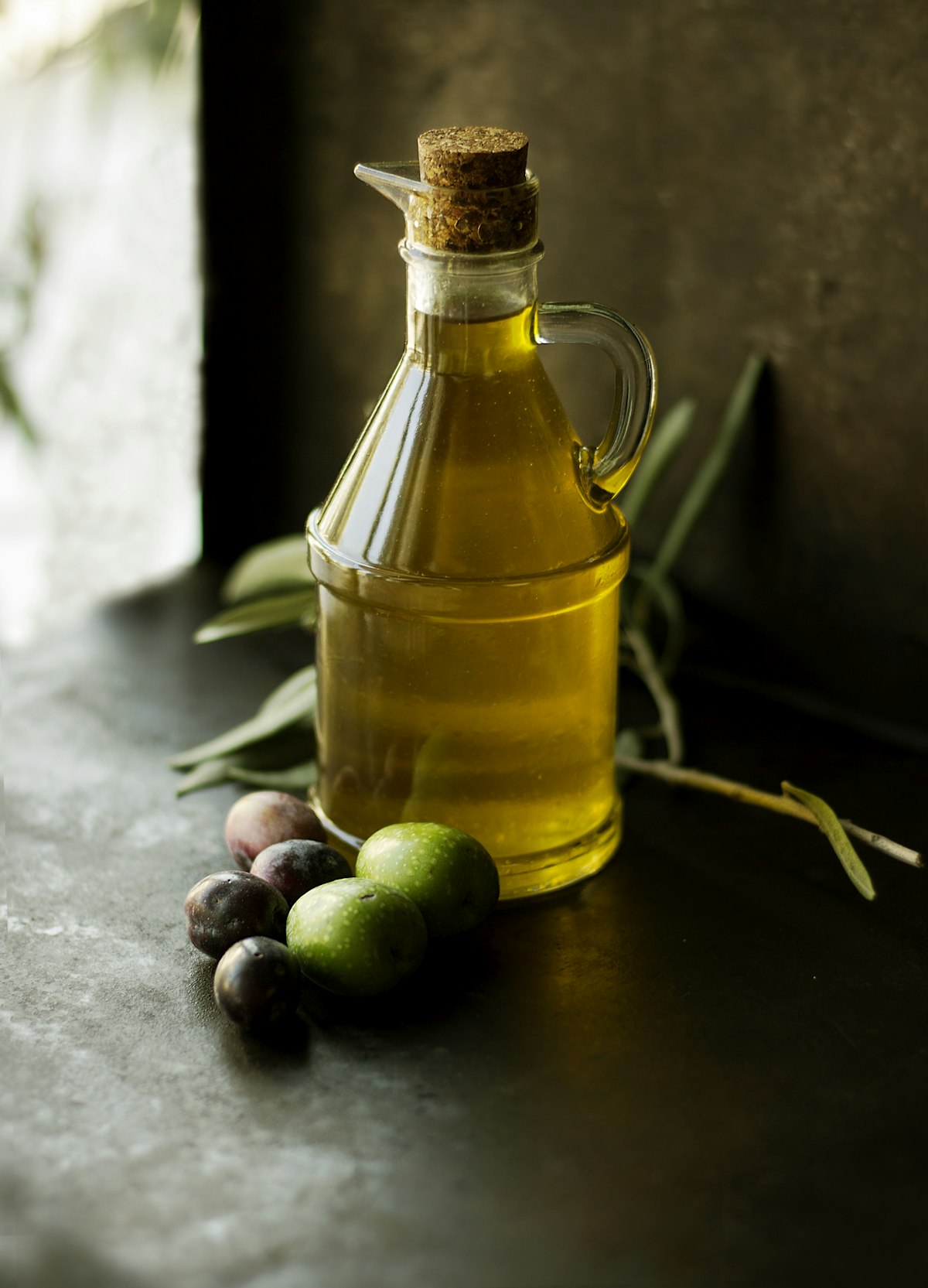Golden oil in a glass bottle